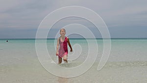 Kid's Child Legs on Sea Sand Seashore