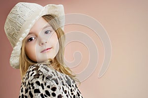 Kid's fashion background.Lovely child girl portrait. Young model