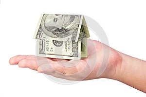 Kid's hand holdling money house