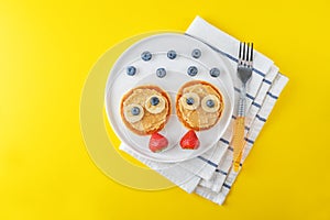 Kid`s healthy breakfasts with funny faces