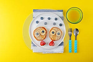 Kid`s healthy breakfasts with funny faces