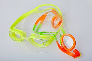 Kid`s pool goggles on white background