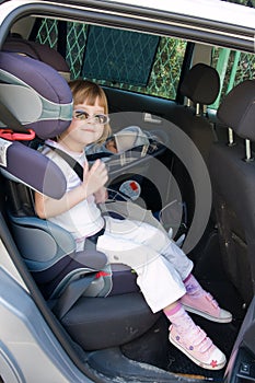 Kid in a safety car seat