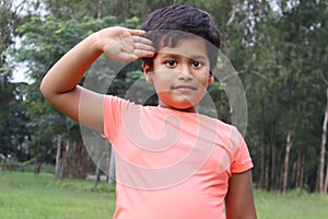 A kid with a Salute