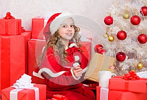 Kid santa hat enjoy christmas eve. Child writing letter to santa claus. Dear santa. Believe in miracle. Girl little cute