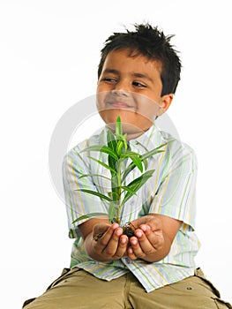 Kid with sapling photo