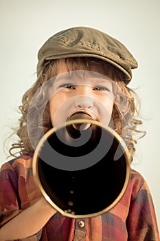 Kid shouting through megaphone