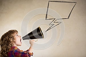 Kid shouting through megaphone