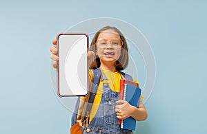 Kid showing screen of mobile phone
