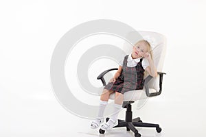 Kid sit on chair and thinking