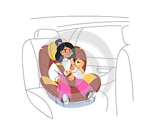 Kid sitting in baby car seat. Cute little girl child travels in safety auto carrier. Toddler in kids security chair with