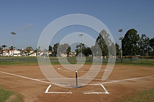 Kid sized empty t ball baseball field at a park photo