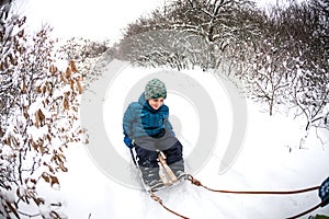 Kid on the sleigh