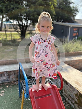 Kid on slide