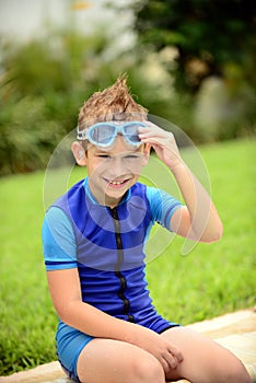 Kid smiling and ready for swimming