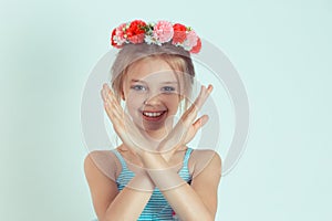 Kid smiling showing crossed arms stop sign hands gesture