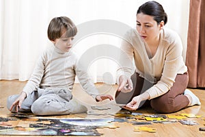 Kid Solving a Puzzle