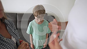 Kid son feels upset while parents fighting at background, sad little girl frustrated with psychological problem caused