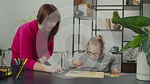 Kid with special needs playing with shape sorter toy