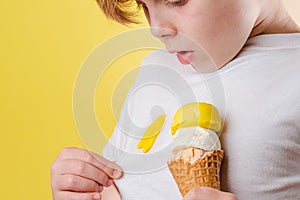 Kid spilling ice cream on white clothes. Clothes ruining. isolated. daily life stain concept