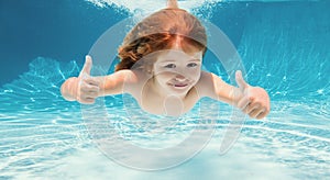 Kid swim underwater in pool. Child boy swimming under water with thumbs up. Banner for header, copy space. Poster for