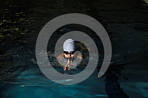 Kid swimming breaststroke