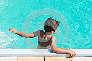 Kid in swimming pool