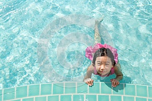 Kid in swimming pool