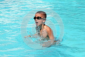 Kid in swimming pool  stock photo silhouette