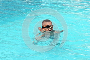 Kid in swimming pool  stock photo silhouette