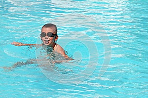 Kid in swimming pool  stock photo silhouette