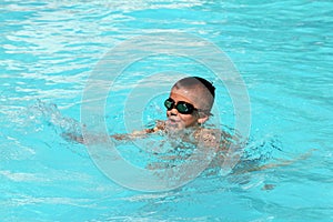 Kid in swimming pool  stock photo silhouette