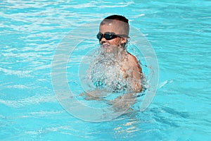 Kid in swimming pool  stock photo silhouette