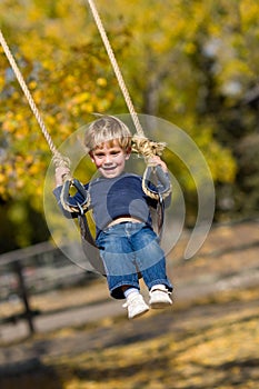 Kid on swing