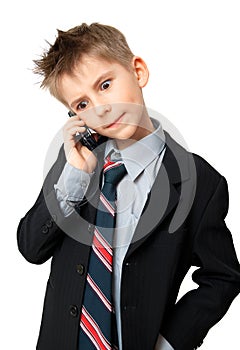 Kid talking on a cell phone photo