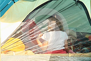 Kid in a tent