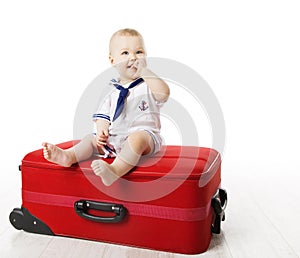 Kid on Travel Suitcase, Baby Boy Sitting on Red Luggage, One Year Old Child on White