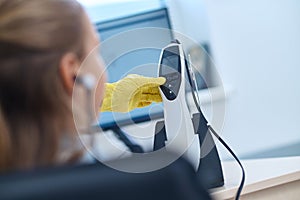 Kid undergoing the hearing screening procedure at a clinic