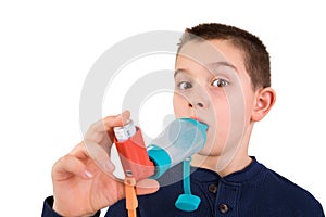 Kid using Inhaler with Spacer