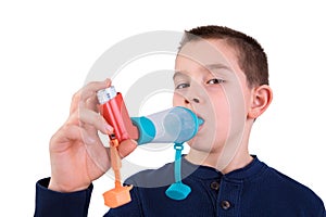 Kid using Inhaler with Spacer photo
