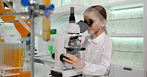 Kid Using Microscope in School Chemistry Lab, Student Child Studying in Laboratory, Girl Experiments in Science Class