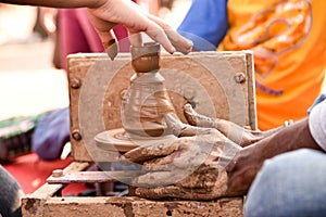 Kid using Potters Wheel