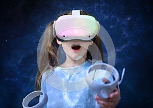 Kid using virtual reality headset, cute child looking in VR glasses photo
