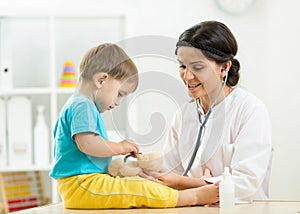 Kid visiting pediatrician at doctor office