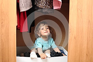 Kid in wardrobe