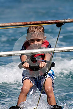 Kid on waterskis