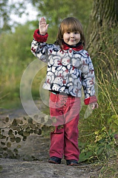 Kid waving for goodbye