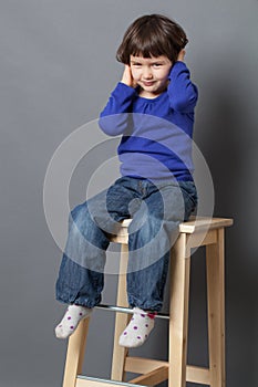 Kid wellbeing concept for thrilled preschool child photo