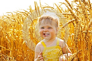 Kid in wheat