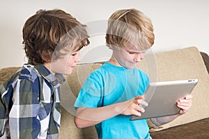 Kid working on a tablet computer